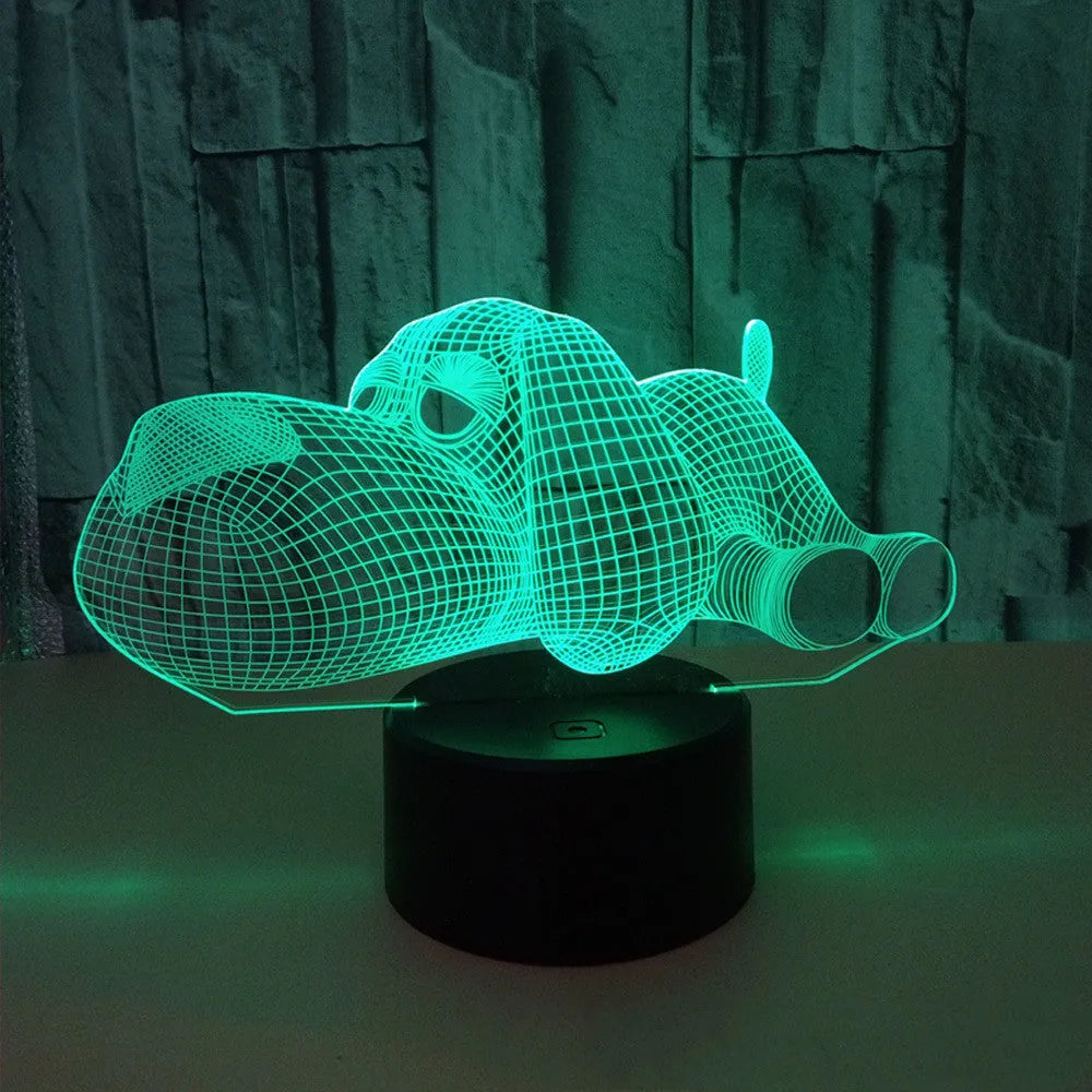 Dog-shaped desktop lamp glowing in blue, with touch button and USB cable.