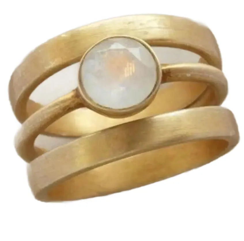Gold geometric titanium steel ring with hollow design and micro-inlaid white chalcedony elements