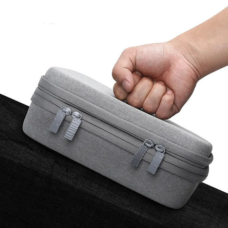 Black EVA digital storage bag for headphones and tech accessories with organisational compartments
