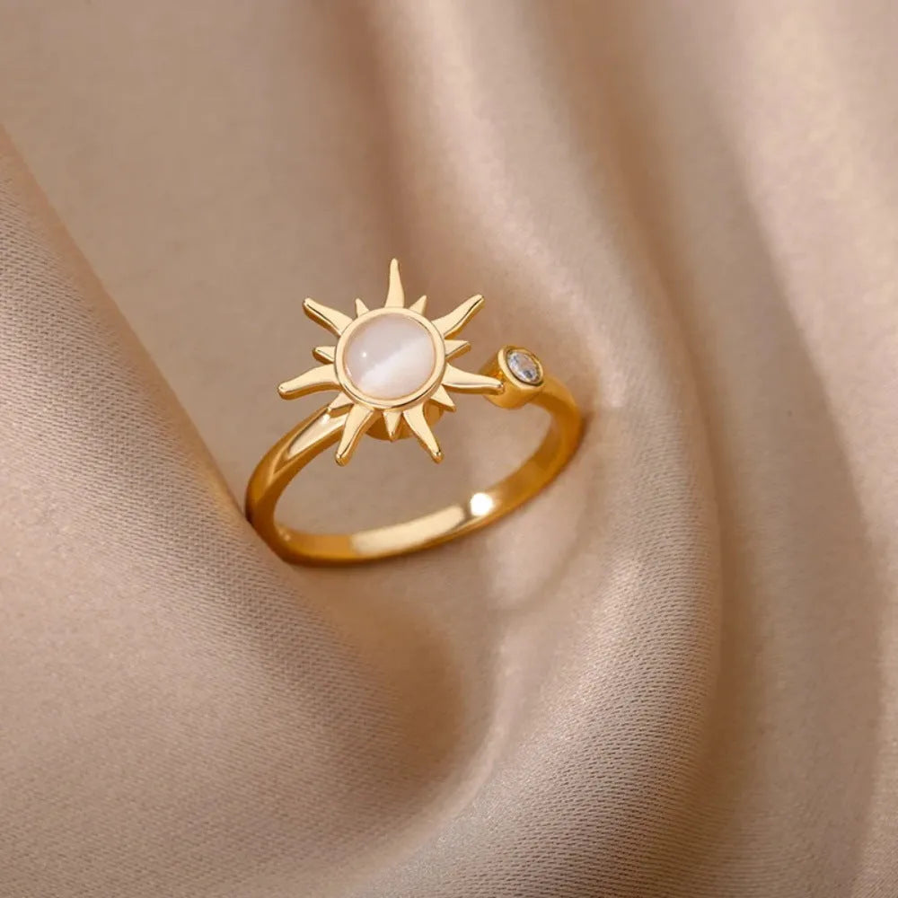 Simple geometric rotatable decompression ring with adjustable opening in gold electroplated finish