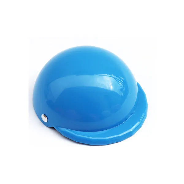 Plastic dog motorcycle cap helmet in various colours and sizes on a table