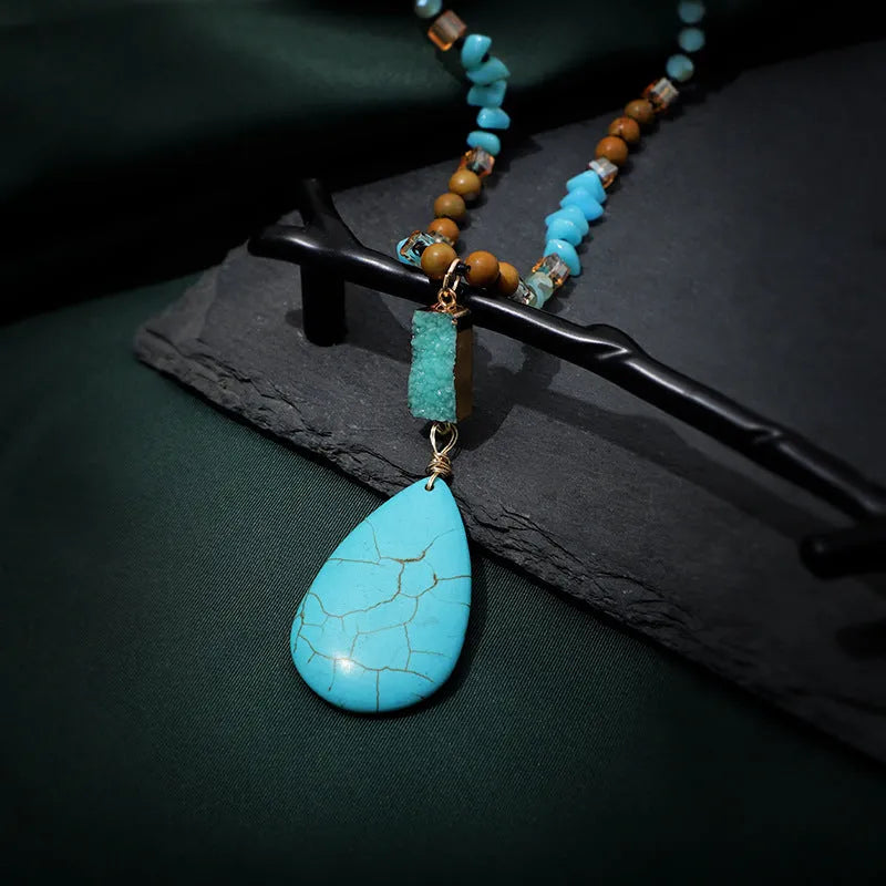 Blue turquoise water drop pendant necklace with mixed gem inlay on a long ball bead chain