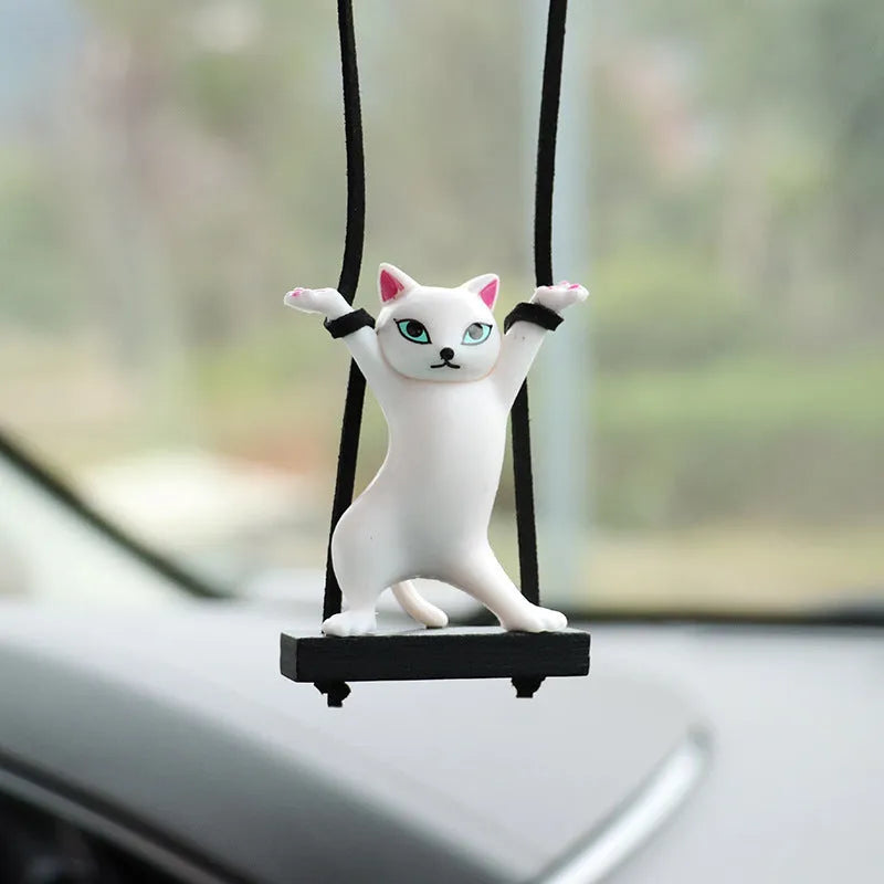 Cartoon-style resin cat pendant on an adjustable rope for car interior decoration.