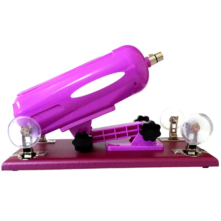 Purple automatic telescopic thrusting sex toy for women on a plain background.