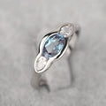 Geometric ellipse zircon ring in white gold colour showing contemporary design