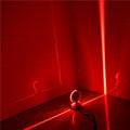 Modern aluminium LED bar wall lamp with glass lens, shown in a corridor setting.