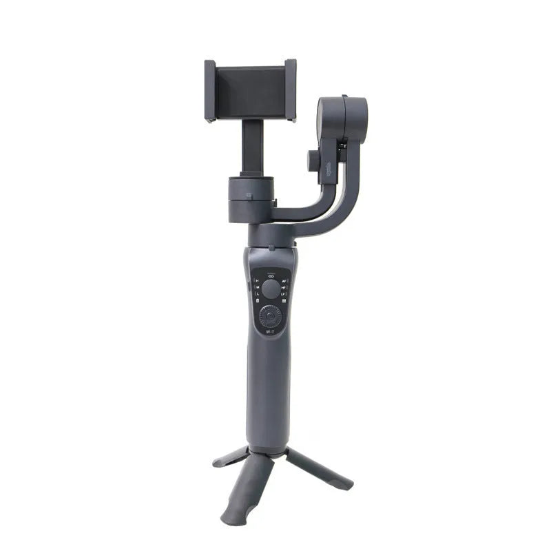 Black three-axis phone gimbal stabilizer with tripod accessory on table