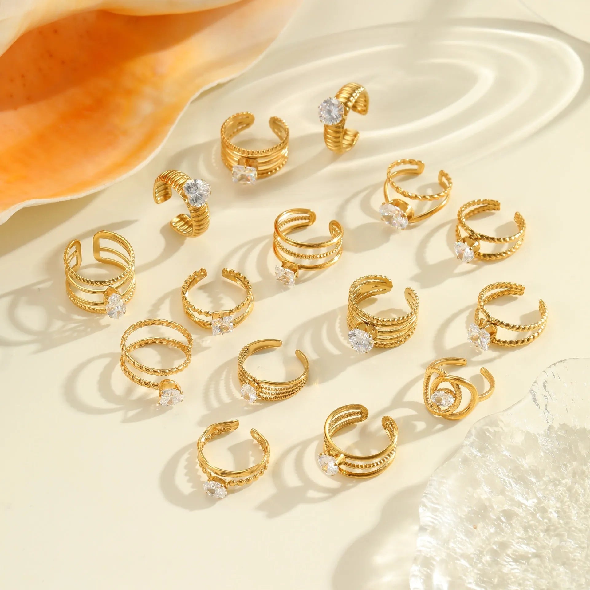 Gold inlaid zircon stainless steel ring with open mouth geometry heart drop design