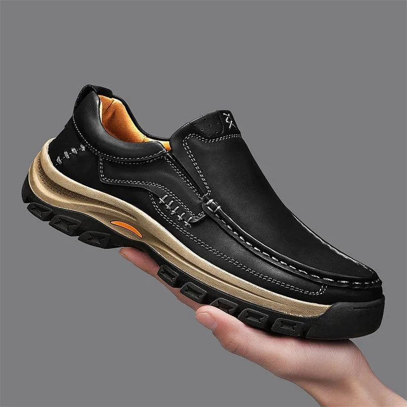 Men's black leather mountaineering shoes with thick rubber soles and round toe design