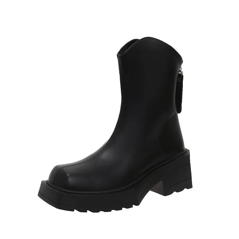 Women's black platform Martin ankle boots with a square toe and back zipper on a white background