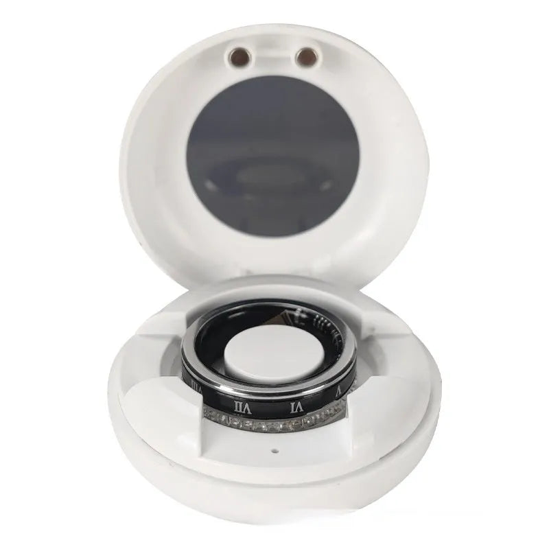 Silver and gold smart ring with diamond inlay and blood oxygen monitoring sensors.