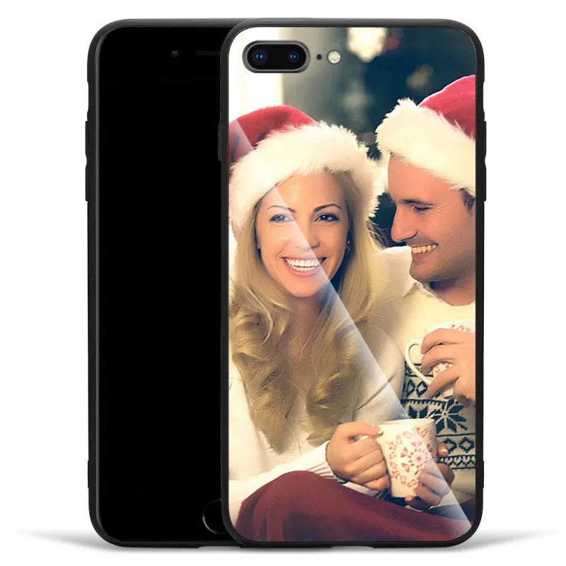 Patterned iPhone case with raised edges on a table next to an iPhone.