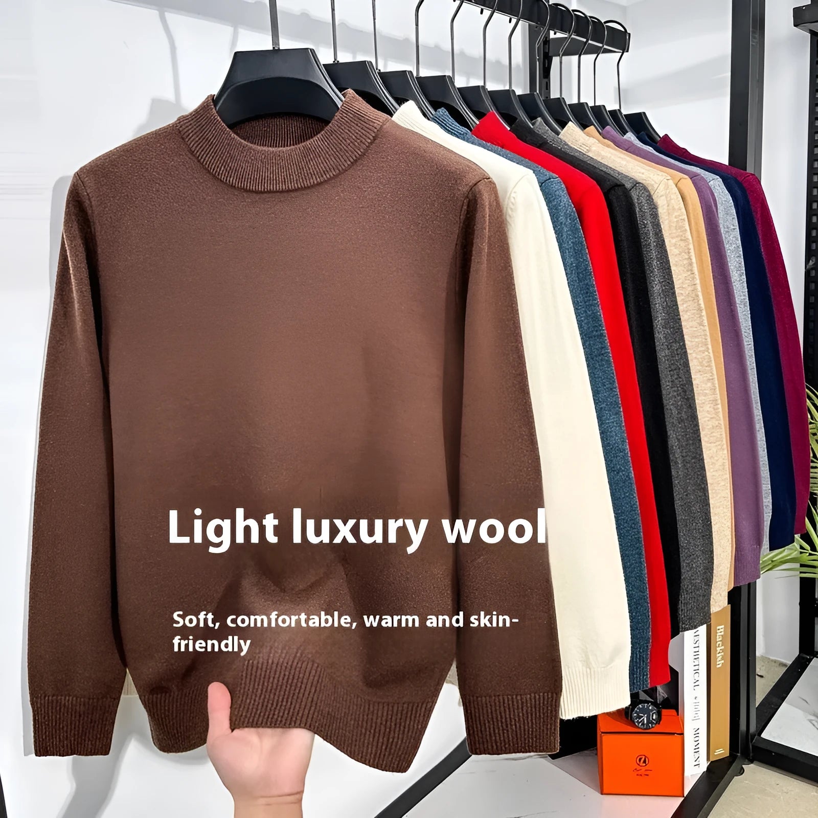 Men's fine wool half turtleneck sweater in a solid colour, showing long sleeves and regular fit.