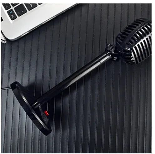 Black USB desktop microphone with an adjustable gooseneck stand on a weighted base.