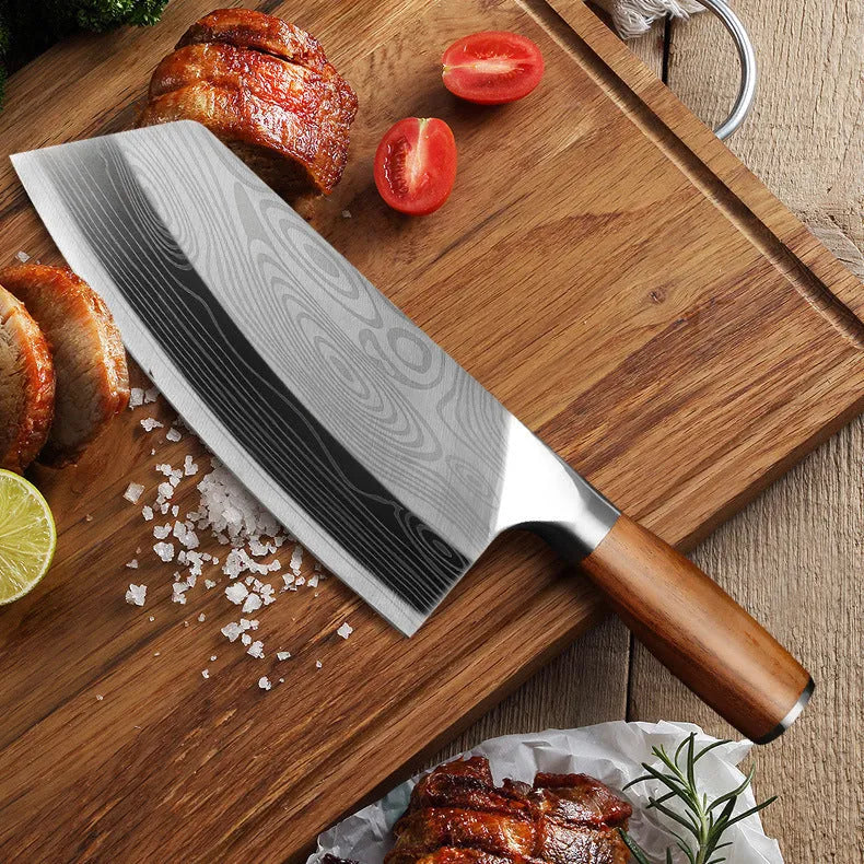 Stainless steel kitchen knife with a 320mm blade on a wooden cutting board.