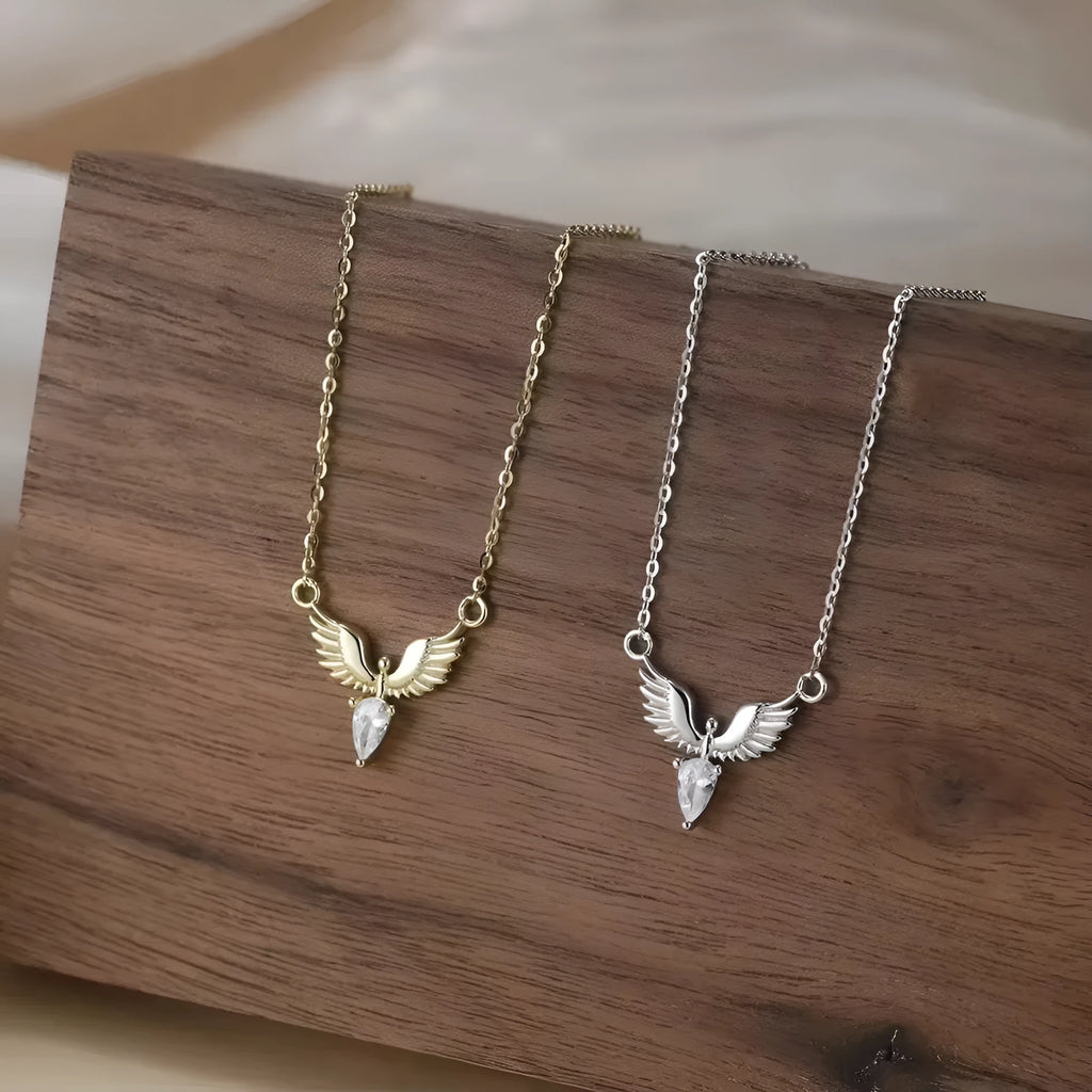 Silver eagle pendant necklace on an adjustable O-ring chain, shown in white gold colour finish.