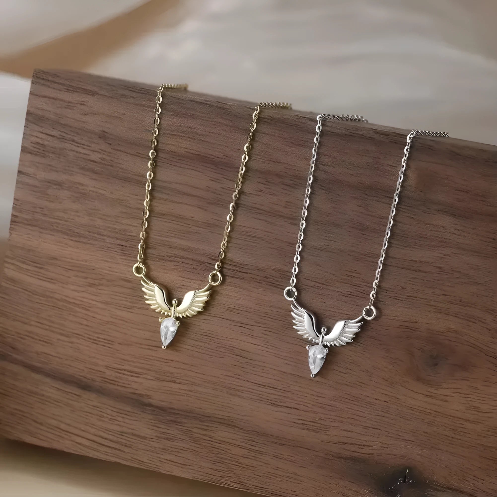 Silver eagle pendant necklace on an adjustable O-ring chain, shown in white gold colour finish.