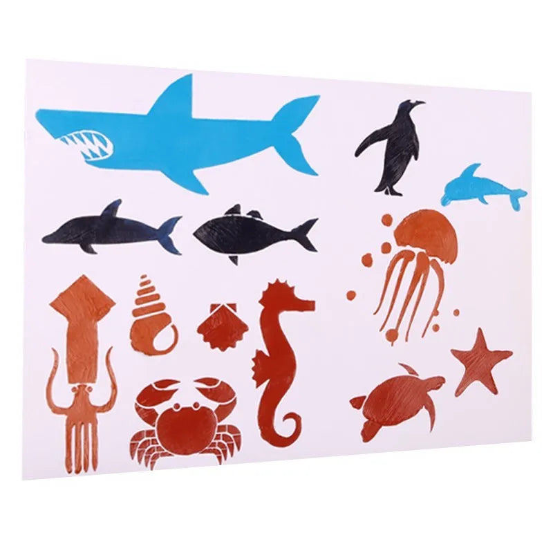 Set of white plastic drawing stencils with assorted cut-out patterns for crafts and decoration.
