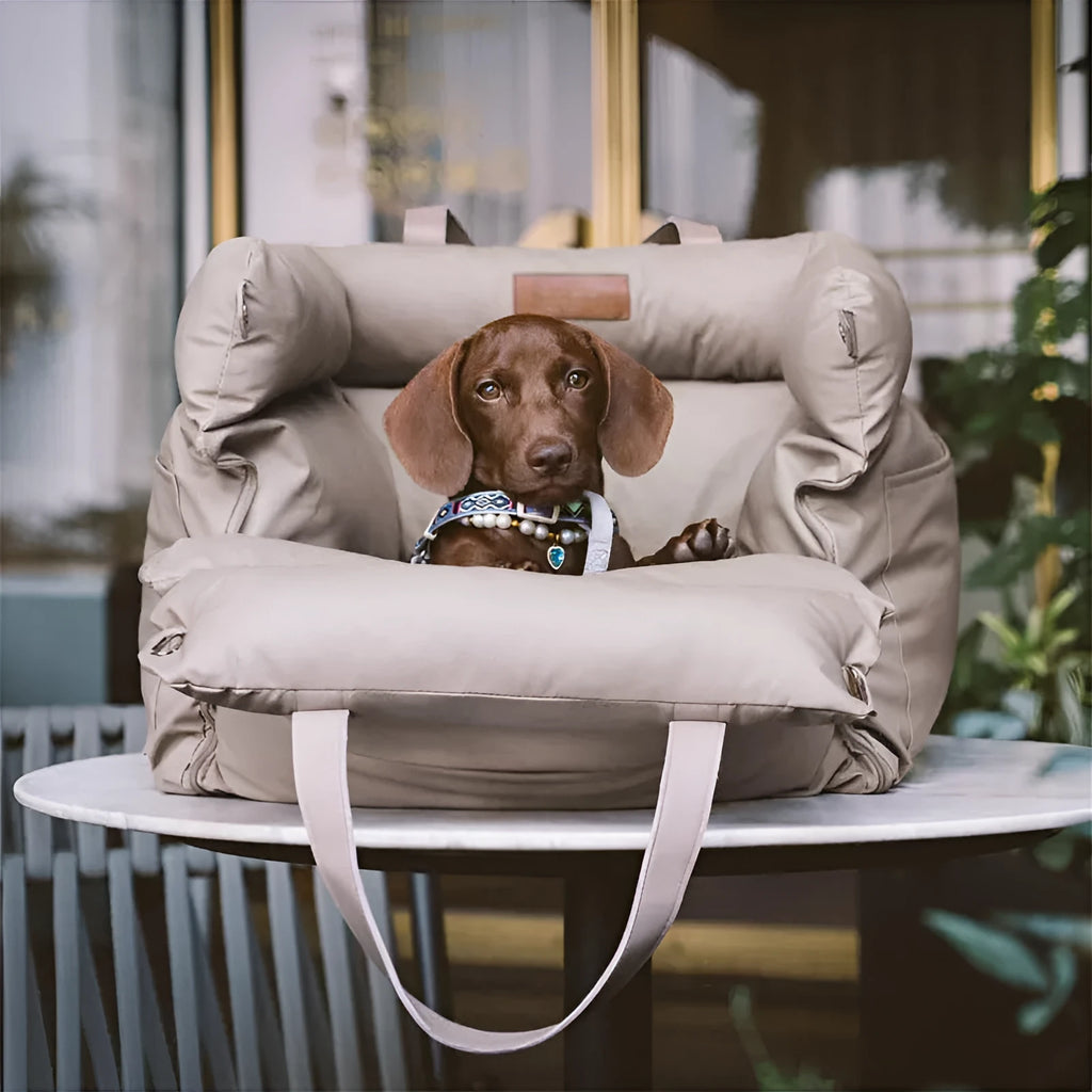 Green waterproof dog car bed with removable washable cover, shown on a car seat.
