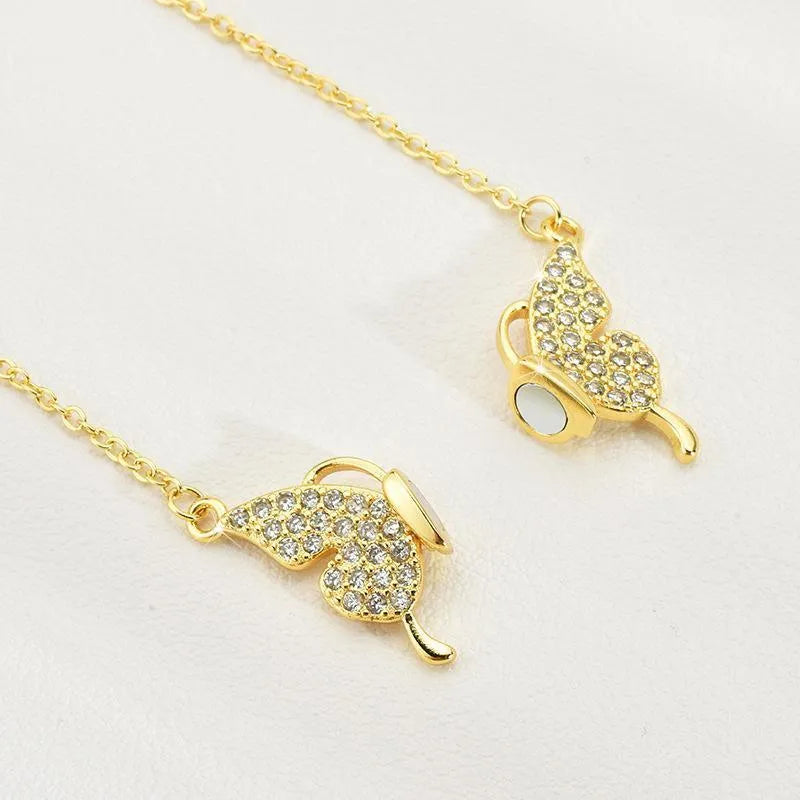 Gold titanium steel clavicle chain necklace with magnetic butterfly charm and twisted chain