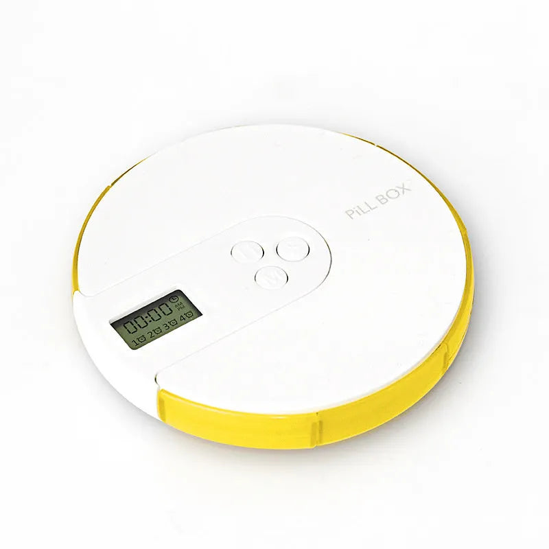 Blue 7-compartment alarm clock pill dispenser showing timer display and open lid with compartments.