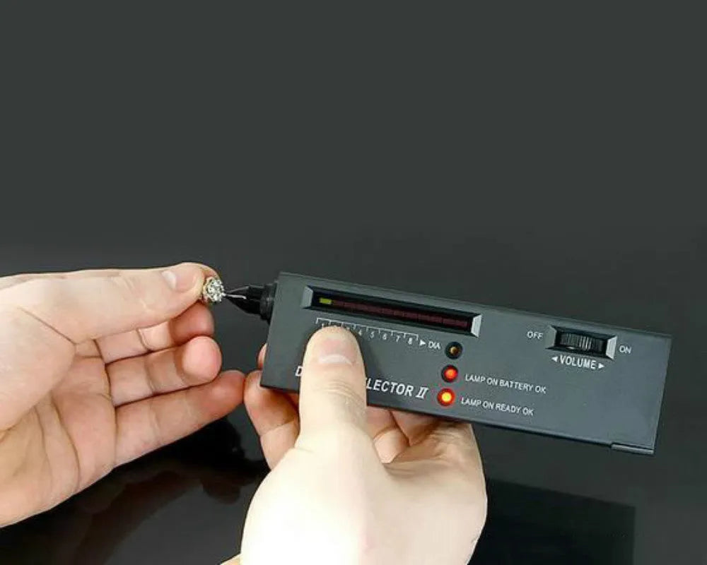 Black portable diamond thermal conductivity tester with metal probe for gemstone verification