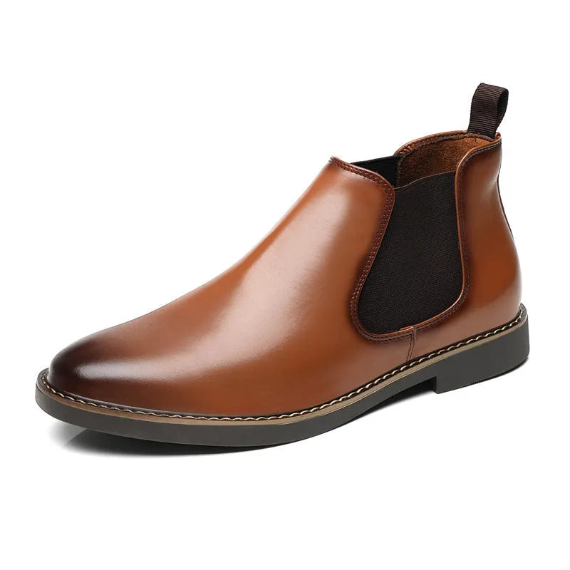Formal black pointed-toe leather boots with a square heel and rubber sole on a plain background.