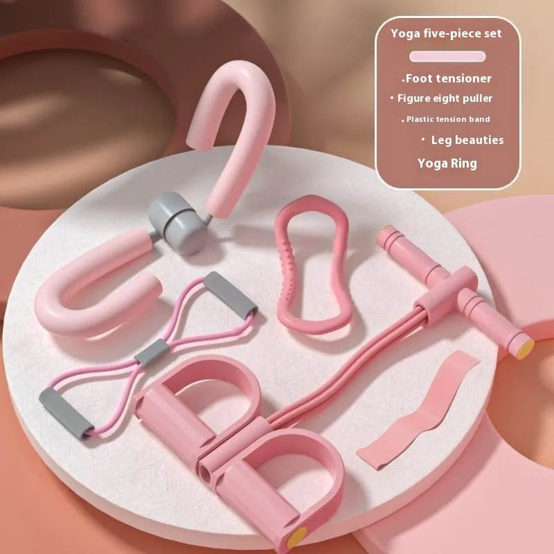 Yoga four piece set showing leg stretching device, pedal exerciser, yoga ring, and tension rope for home fitness training