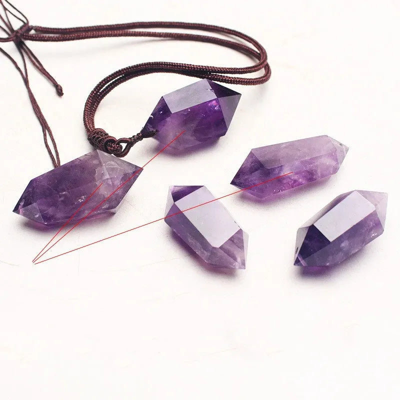 Natural amethyst hexagonal pendant with adjustable chain on purple background