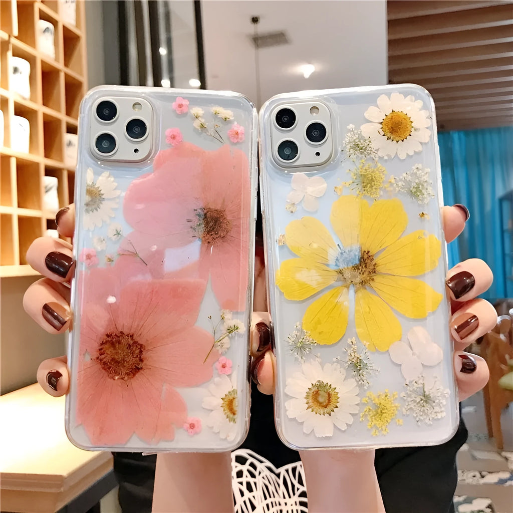 Floral TPU phone case with large pink flower design on back, shown fitted on an iPhone.