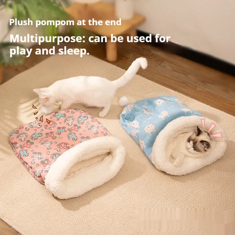 Flannel cat sleeping bag pet bed in pink Trojan pattern, 50cm by 40cm.