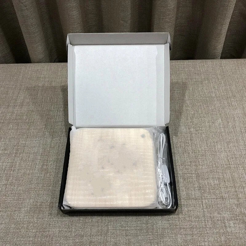 Square pine wood USB LED atmosphere lamp emitting warm white light.