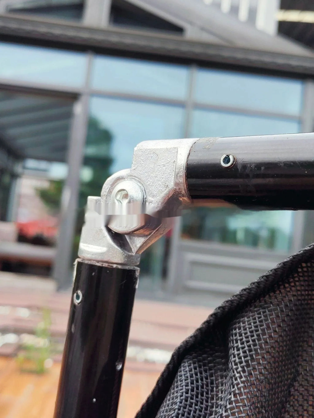 Large black aluminium alloy folding stretcher for emergency transport of dogs