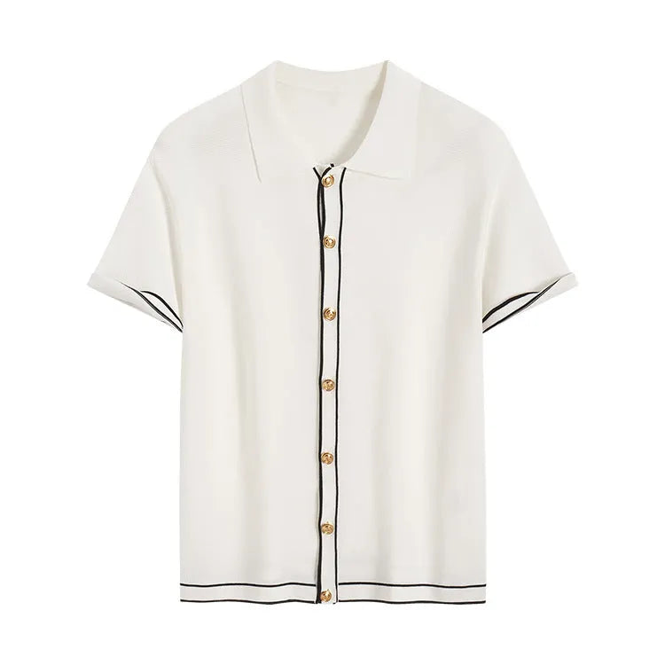 White short sleeve women's cardigan with dark contrast colour lapels laid flat.