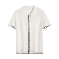 White short sleeve women's cardigan with dark contrast colour lapels laid flat.