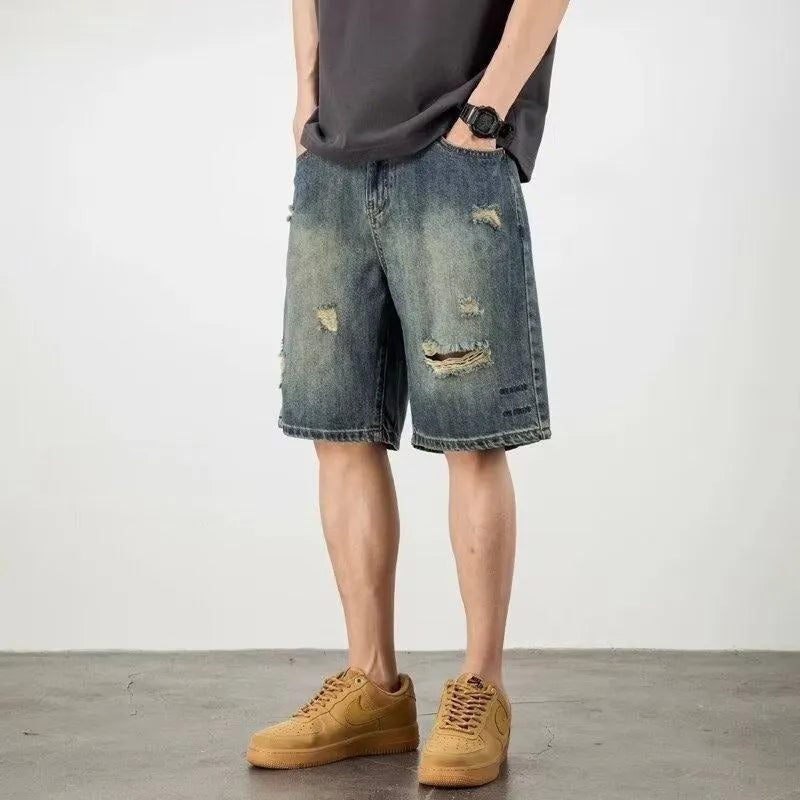 Men's blue retro loose hole denim shorts with straight leg fit