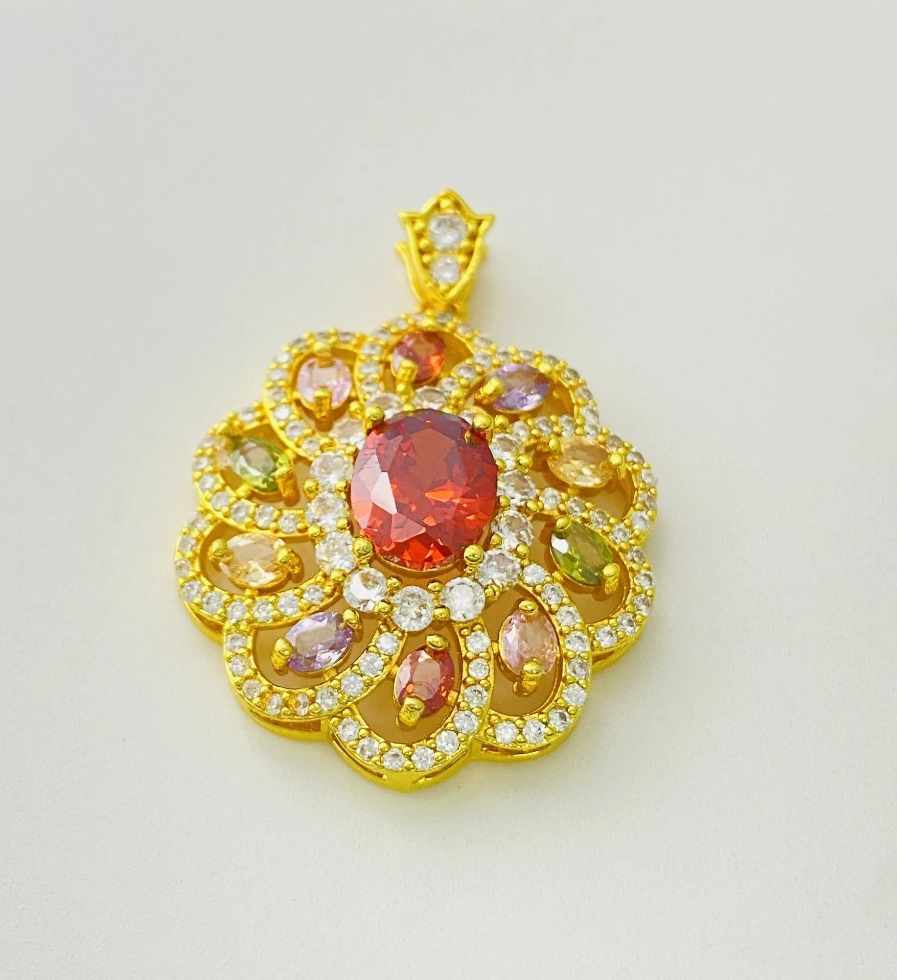 Women's colourful zircon floral pendant necklace showing gold, champagne gold and platinum colour options
