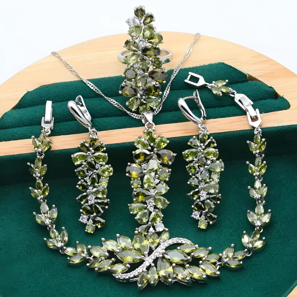 Retro jewellery set with plant pattern design showing necklace, bracelet, earrings, and ring in alloy and copper zircon
