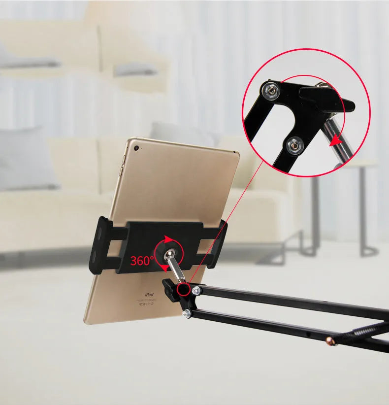 Adjustable black phone tablet stand on desktop holding mobile device at viewing angle