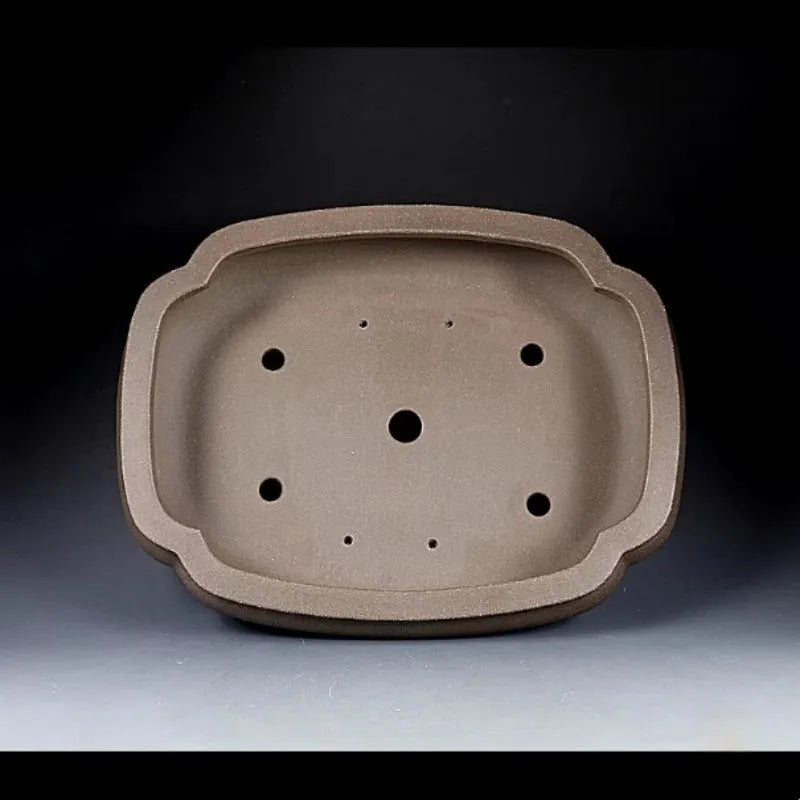 Handmade antique purple clay papaya-shaped flower pot shown from side displaying dimensions.