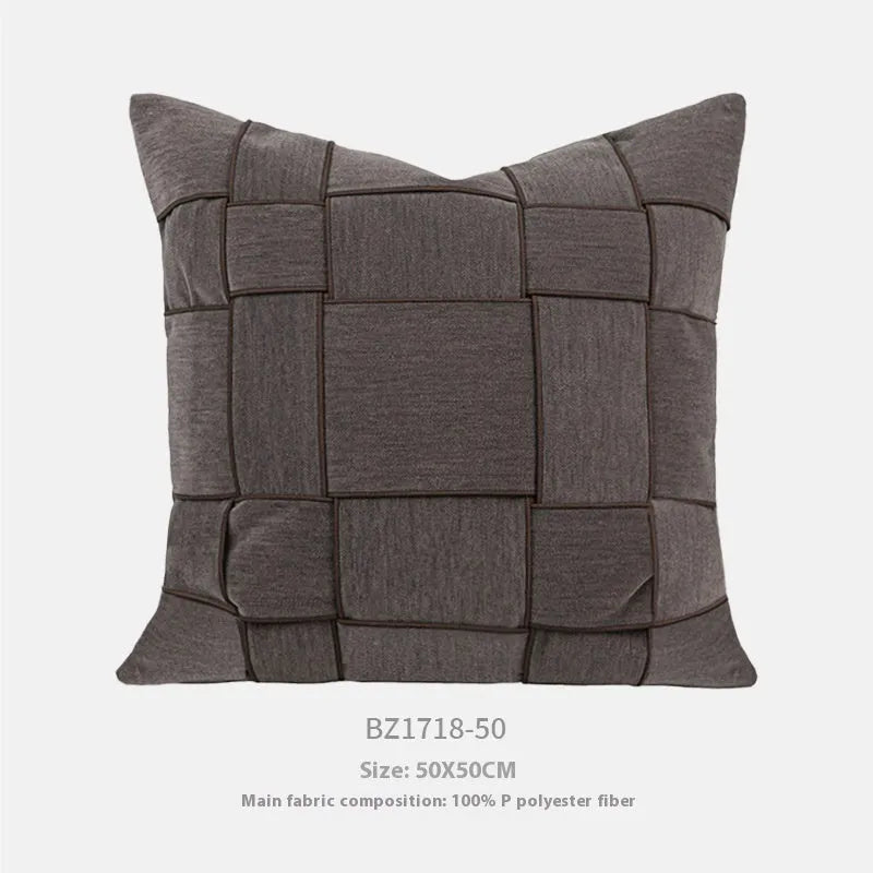 50cm square chenille woven pillow cushion in a choice of seven colours on a sofa.