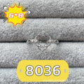 Oval denier ring with open mouth design and five-pointed star decoration on copper band