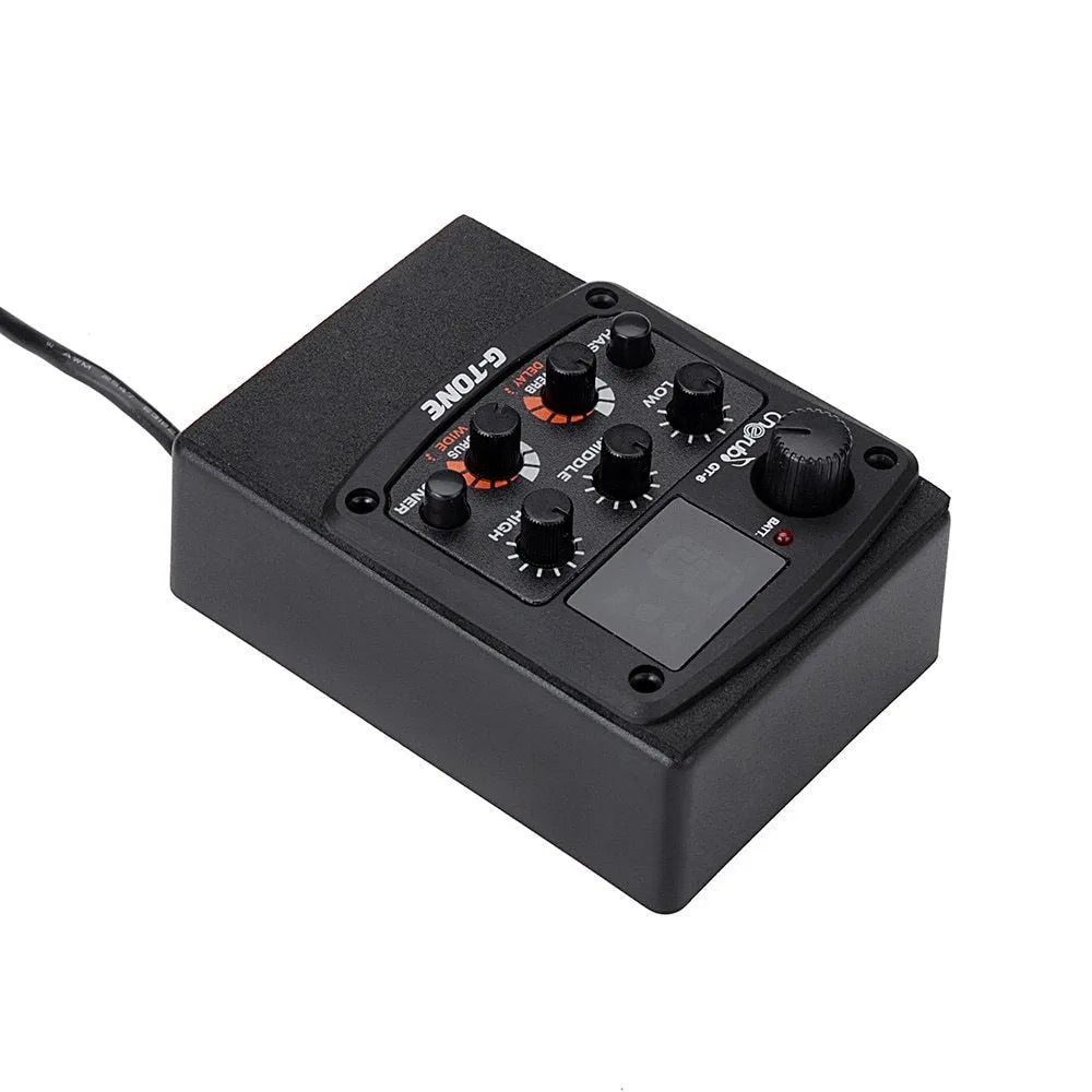 Black Cherub GT-6 acoustic guitar soundhole pickup with EQ knobs and effects controls.