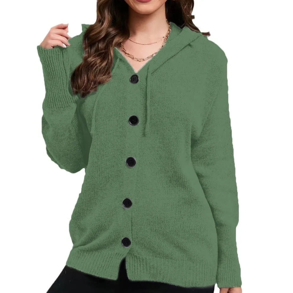Women's solid colour hooded cardigan sweater in thick cotton fabric showing loose fit and regular sleeves