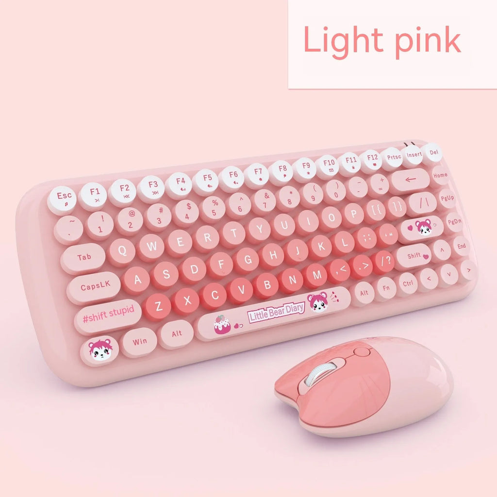 Pink mini wireless keyboard and mouse set with compact design and cartoon aesthetic