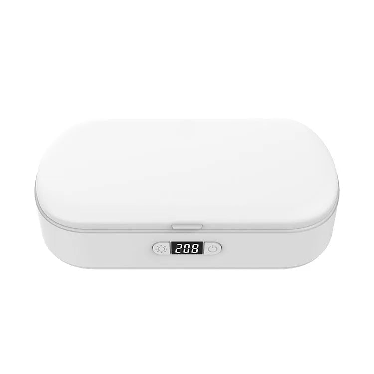 White ABS plastic UV steriliser and wireless charging box for phones and small items.