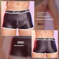 Men's nylon boxers in black, sapphire blue, and white colours, showing silky fabric texture.