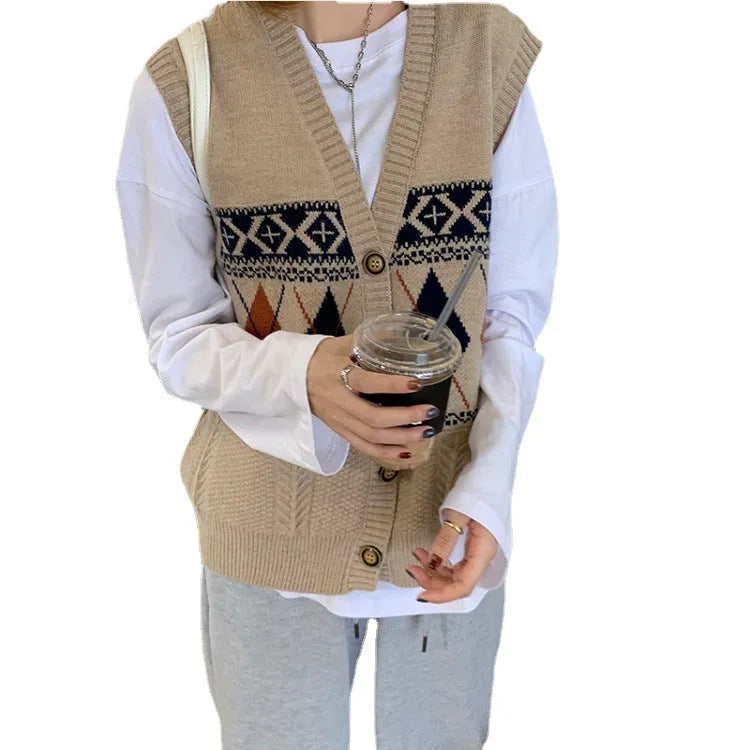 Woman wearing a sleeveless loose-fit cardigan top with a diamond plaid pattern in khaki.