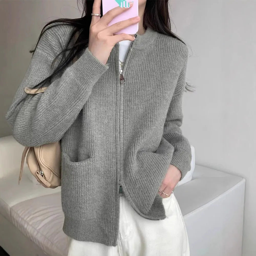 Women's soft sweater coat in temperature-sensitive fabric showing beige colour option with long sleeves and cardigan styling