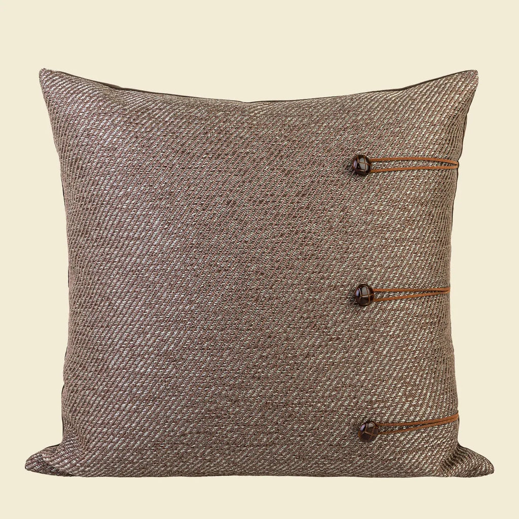 Chinese ancient style square pillow cushion in Maillard colours on a sofa.